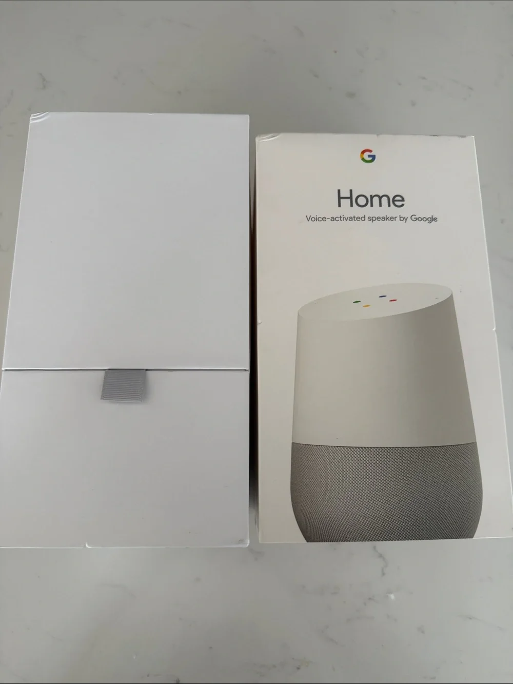 google Home Smart Speaker in White and Gray